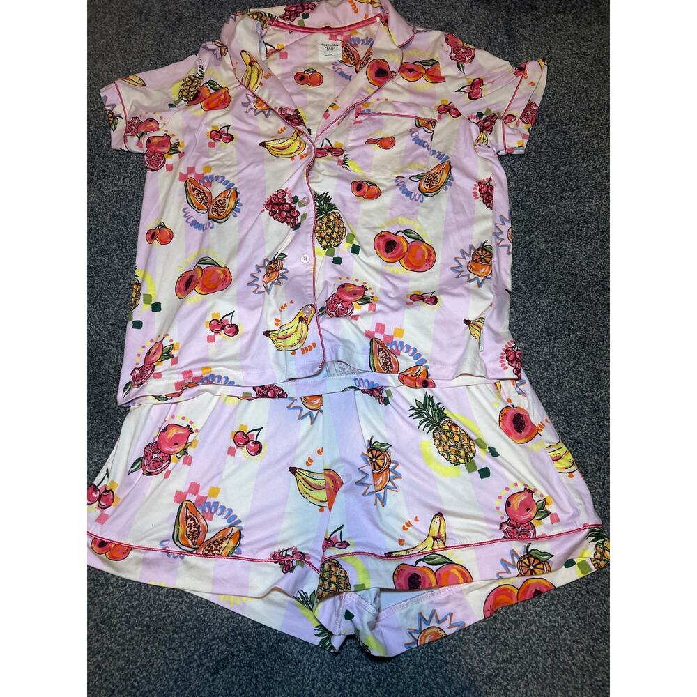 Chelsea Peers pajama vibrant pink striped background with playful fruit pattern